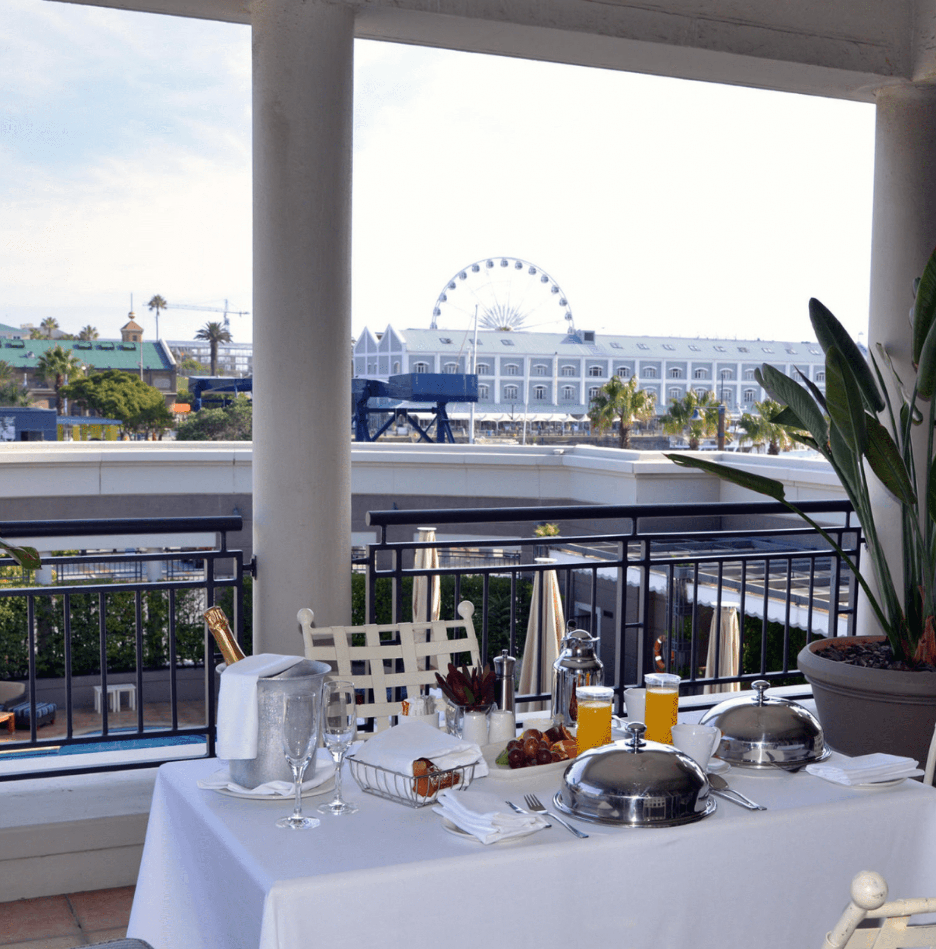 private breakfast on balcony overlooking Victoria Albert waterfront