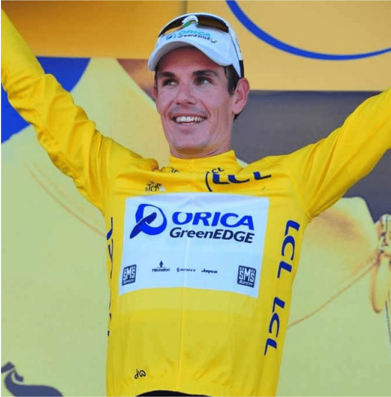 Daryl Impey wearing yellow Tour de France jersey