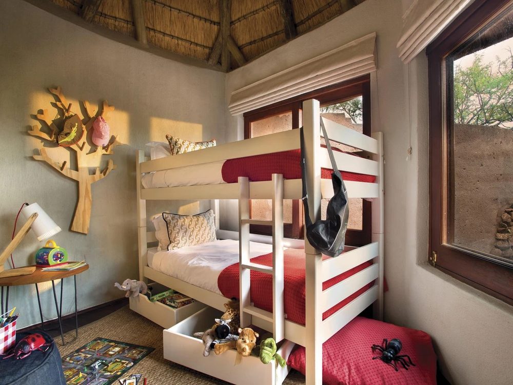 Children’s room with bunk beds in a family suite at Madikwe Safari Lodge