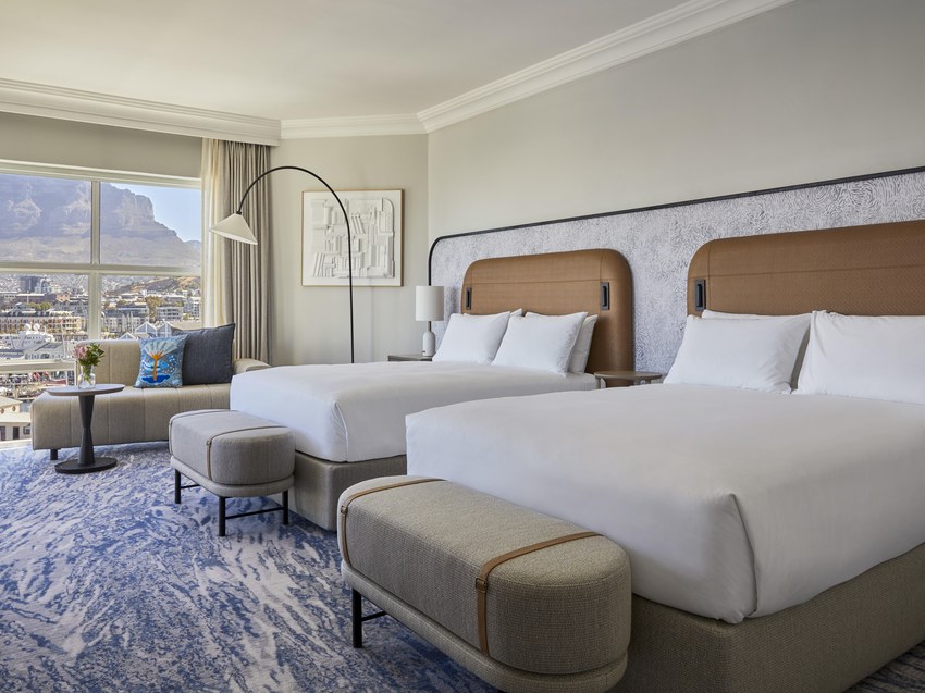 A guest room at the InterContinental Table Bay with Table Mountain visible through the window