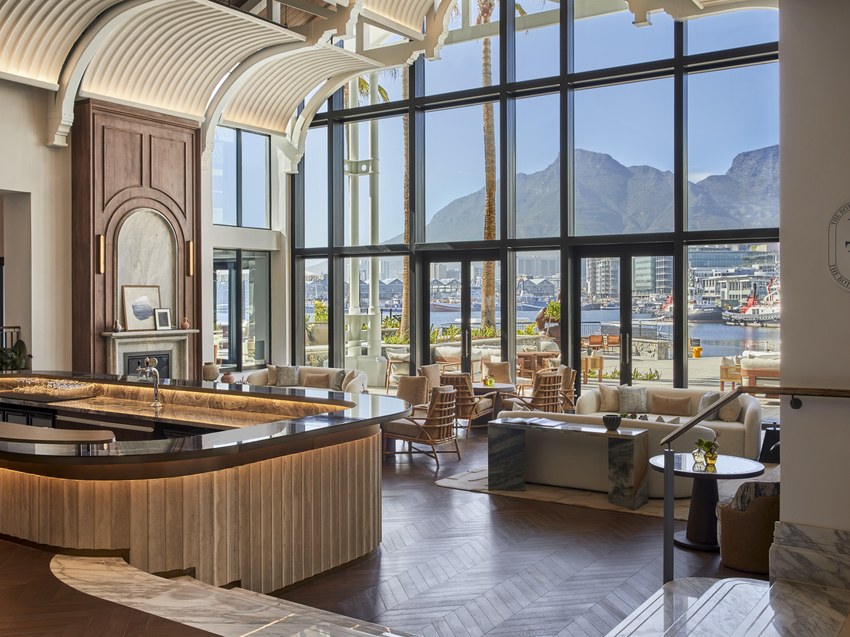 The Botanist restaurant and bar at the InterContinental Table Bay, with tall windows looking towards Table Mountain