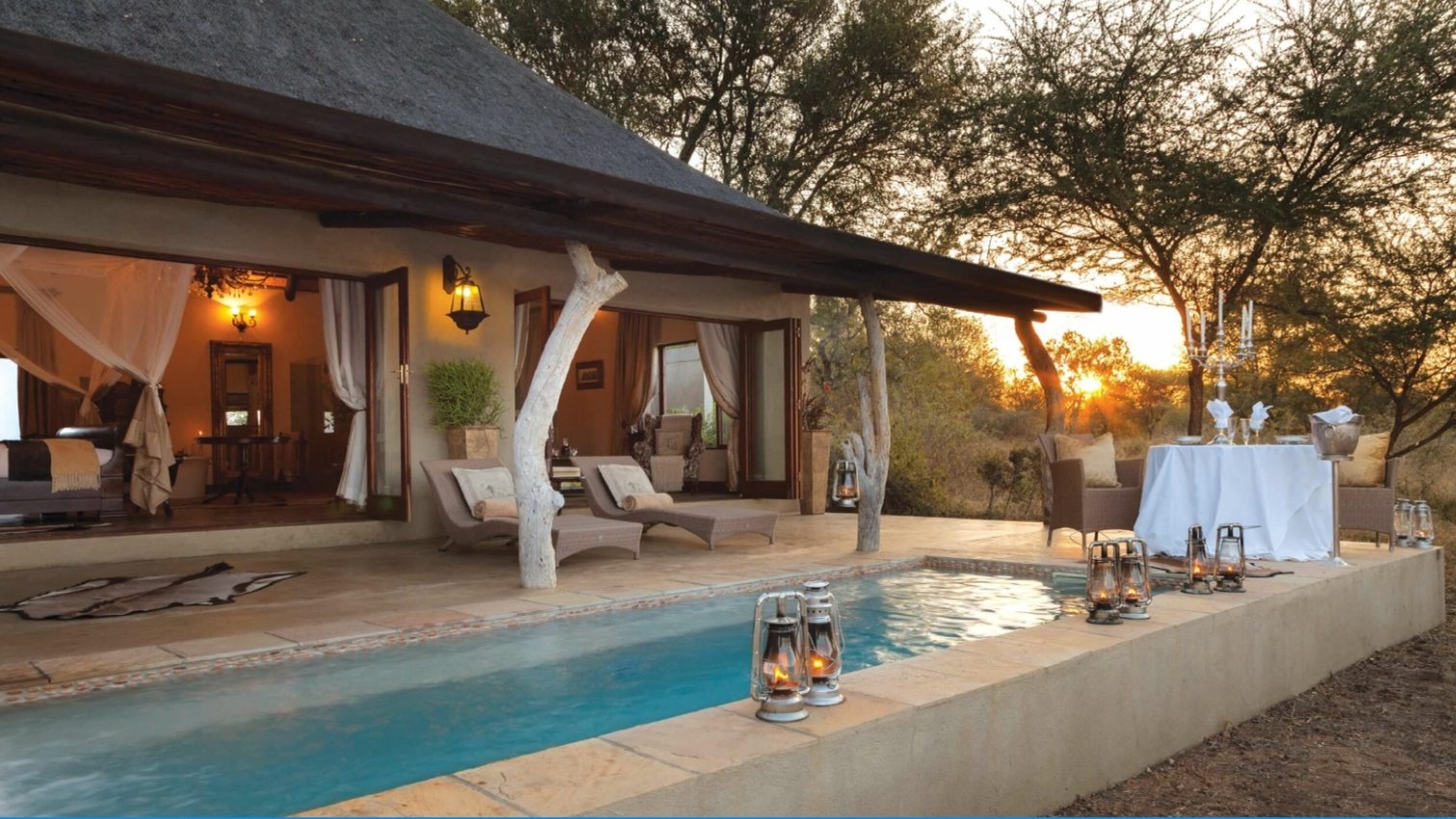 Suite terrace, private pool and lantern-lit dinner at sunset, Kings Camp, Timbavati