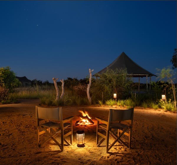 Fireside dinner setting at Amaya Lodge in the Greater Kruger